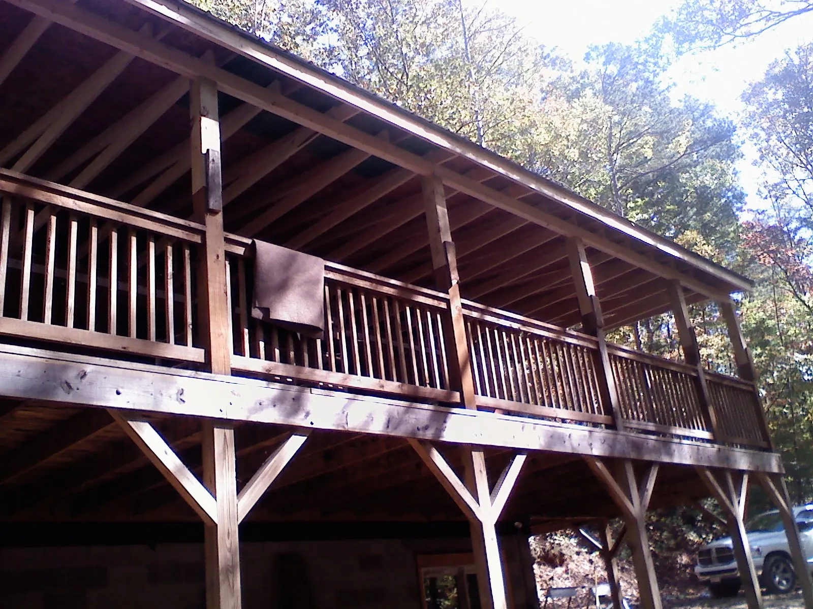 Timber framing under a new elevated porch and deck — Roof Leak Repair in Battle Ground by Roofing Brothers